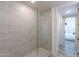 Sleek glass shower in a modern bathroom with tiled walls and floors at 3131 N Central Ave # 6011, Phoenix, AZ 85012