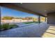 View of pool and outdoor kitchen from patio at 8366 E Old Paint Trl, Scottsdale, AZ 85266