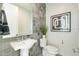 Small bathroom with pedestal sink and gray tile at 8366 E Old Paint Trl, Scottsdale, AZ 85266