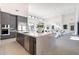 Modern kitchen with large island and stainless steel appliances at 8366 E Old Paint Trl, Scottsdale, AZ 85266