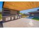 Modern outdoor kitchen with stainless steel appliances at 8366 E Old Paint Trl, Scottsdale, AZ 85266