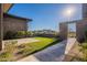 Landscaped side yard with water feature and stone accents at 8366 E Old Paint Trl, Scottsdale, AZ 85266