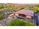Aerial view featuring a backyard pool, outdoor seating, and desert landscaping at 12797 S 179Th Dr, Goodyear, AZ 85338