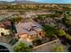 Stunning single Gathering home features professional desert landscaping with golf course and mountain views at 12797 S 179Th Dr, Goodyear, AZ 85338