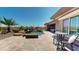 Desert backyard oasis with pool, spa, and patio seating at 12797 S 179Th Dr, Goodyear, AZ 85338
