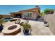 Spacious outdoor area with a firepit, seating, and landscaping, ideal for entertaining at 12797 S 179Th Dr, Goodyear, AZ 85338