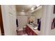 Cozy bathroom features neutral colors, a granite countertop vanity, and a tub with shower, offering comfort and functionality at 12797 S 179Th Dr, Goodyear, AZ 85338
