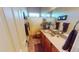 Bathroom features a single sink vanity, granite countertops, and a shower and tub combo at 12797 S 179Th Dr, Goodyear, AZ 85338
