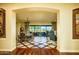 Open-concept dining room has a large sliding glass door to let in plenty of light and amazing views at 12797 S 179Th Dr, Goodyear, AZ 85338
