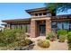Charming single-Gathering home featuring a gated front entrance and professionally landscaped yard at 12797 S 179Th Dr, Goodyear, AZ 85338