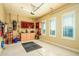 Garage with storage, work bench, and natural light from windows at 12797 S 179Th Dr, Goodyear, AZ 85338