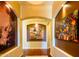 Inviting hallway features hardwood floors, recessed lighting, and art niches perfect for displaying artwork at 12797 S 179Th Dr, Goodyear, AZ 85338