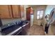 Well-equipped laundry room features ample cabinetry, a utility sink, a modern washer and dryer, and a convenient refrigerator at 12797 S 179Th Dr, Goodyear, AZ 85338