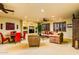 Spacious living room with recessed lighting, a ceiling fan, and a media center built into the wall at 12797 S 179Th Dr, Goodyear, AZ 85338