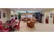 Large living space with neutral tones, plantation shutters, and cozy furniture exudes warmth and offers a comfortable gathering area at 12797 S 179Th Dr, Goodyear, AZ 85338