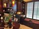 Well-appointed office space with custom cabinetry, built-in desk, and natural light at 12797 S 179Th Dr, Goodyear, AZ 85338