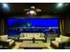 Serene outdoor patio with comfortable seating and ambient lighting for evening enjoyment at 12797 S 179Th Dr, Goodyear, AZ 85338