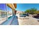 Gorgeous outdoor space featuring a pool, spa, and relaxing lounge area at 12797 S 179Th Dr, Goodyear, AZ 85338