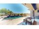 Beautiful backyard with swimming pool, spa, desert landscaping and mountain views at 12797 S 179Th Dr, Goodyear, AZ 85338