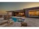 Backyard oasis featuring a pool, patio, and outdoor seating for entertaining and leisure at 12797 S 179Th Dr, Goodyear, AZ 85338