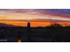 Beautiful view of an Arizona sunset with saguaros from the patio at 12797 S 179Th Dr, Goodyear, AZ 85338