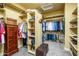 Organized walk-in closet with ample shelving, hanging space, and storage solutions at 12797 S 179Th Dr, Goodyear, AZ 85338