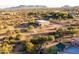 Aerial view of property showing expansive grounds and outbuildings at 14021 E Milton Ct, Scottsdale, AZ 85262