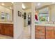 Double vanity bathroom with access to laundry and closet at 14021 E Milton Ct, Scottsdale, AZ 85262