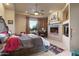 Spacious main bedroom with fireplace and mountain views at 14021 E Milton Ct, Scottsdale, AZ 85262