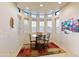 Bright breakfast nook with a round table and bay window at 14021 E Milton Ct, Scottsdale, AZ 85262