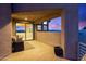 Covered patio with mountain views and comfortable wicker furniture at 14021 E Milton Ct, Scottsdale, AZ 85262