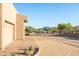 Two-car garage with desert landscaping at 14021 E Milton Ct, Scottsdale, AZ 85262