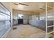 Empty horse stall with metal walls and flooring at 14021 E Milton Ct, Scottsdale, AZ 85262