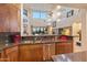 Modern kitchen with stainless steel appliances and a breakfast bar at 14021 E Milton Ct, Scottsdale, AZ 85262