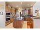 Gourmet kitchen with stainless steel appliances and large island at 14021 E Milton Ct, Scottsdale, AZ 85262