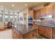Eat-in kitchen with a large island and plenty of cabinet space at 14021 E Milton Ct, Scottsdale, AZ 85262
