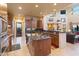 Gourmet kitchen with island, stainless steel appliances, and granite counters at 14021 E Milton Ct, Scottsdale, AZ 85262
