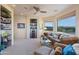 Home office with built in shelves and views of the desert landscape at 14021 E Milton Ct, Scottsdale, AZ 85262