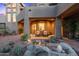 Relaxing patio with fountain and seating area, creating a tranquil outdoor space at 14021 E Milton Ct, Scottsdale, AZ 85262