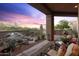 Peaceful patio with water feature and comfortable seating, perfect for relaxing at 14021 E Milton Ct, Scottsdale, AZ 85262