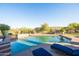 Sparkling pool with ample deck space for sunbathing at 14021 E Milton Ct, Scottsdale, AZ 85262