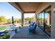 Spacious patio with pool access and comfortable seating at 14021 E Milton Ct, Scottsdale, AZ 85262