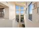 Bright stairwell with multiple windows and natural light at 14021 E Milton Ct, Scottsdale, AZ 85262