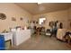 Laundry and tack room with ample storage at 14021 E Milton Ct, Scottsdale, AZ 85262
