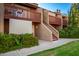 Attractive exterior of a condo building with landscaping and walkways at 14203 N 19Th Ave # 1055, Phoenix, AZ 85023
