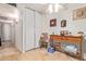 Condo hallway with tile floors and built-in closet at 14203 N 19Th Ave # 1055, Phoenix, AZ 85023