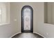 Wrought iron door provides curb appeal to this home at 578 E Las Puertas Ln, Queen Creek, AZ 85140