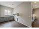 Mud room with storage, natural light and wood floors at 578 E Las Puertas Ln, Queen Creek, AZ 85140