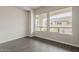 This bright office includes wood floors and several large windows with neighborhood views at 578 E Las Puertas Ln, Queen Creek, AZ 85140