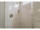 Walk-in shower featuring subway tile and a sleek shower head at 578 E Las Puertas Ln, Queen Creek, AZ 85140